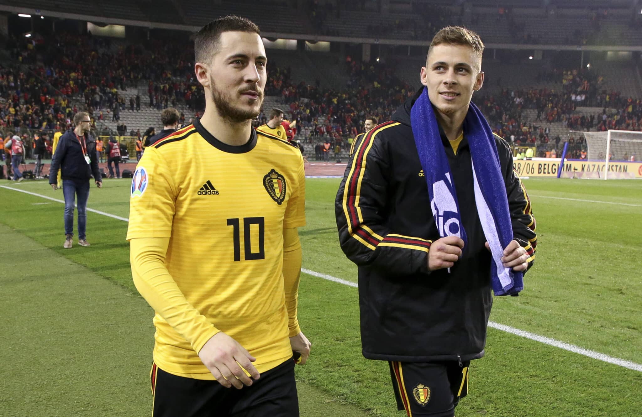 Eden Hazard and his brother Thorgan Hazard of Belgium celebrate the victory following the 2020 UEFA European Championships