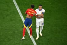 Nations League: Lamine Yamal of Spain embraces Kylian Mbappe of France prior to the UEFA EURO 2024 Semi-Final match between Spain and France at Munich Football Arena on July 09, 2024 in Munich, Germany.