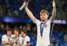 Harvey Elliott of England celebrates with his Player of the Tournament award