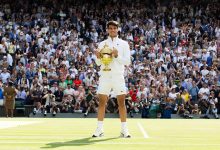 LONDON, ENGLAND - JULY 14: Carlos Alcaraz of Spain holds the trophy after defeating Novak Djokovic of Serbia at the Mens Singles Final against at The Wimbledon Lawn Tennis Championship at the All England Lawn and Tennis Club at Wimbledon on July 14th, 2024 in London, England.