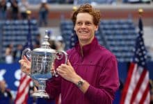 Jannik Sinner of Italy celebrates with the winners trophy after defeating Taylor Fritz of the United States to win the Men's Singles Final on Day Fourteen of the 2024 US Open