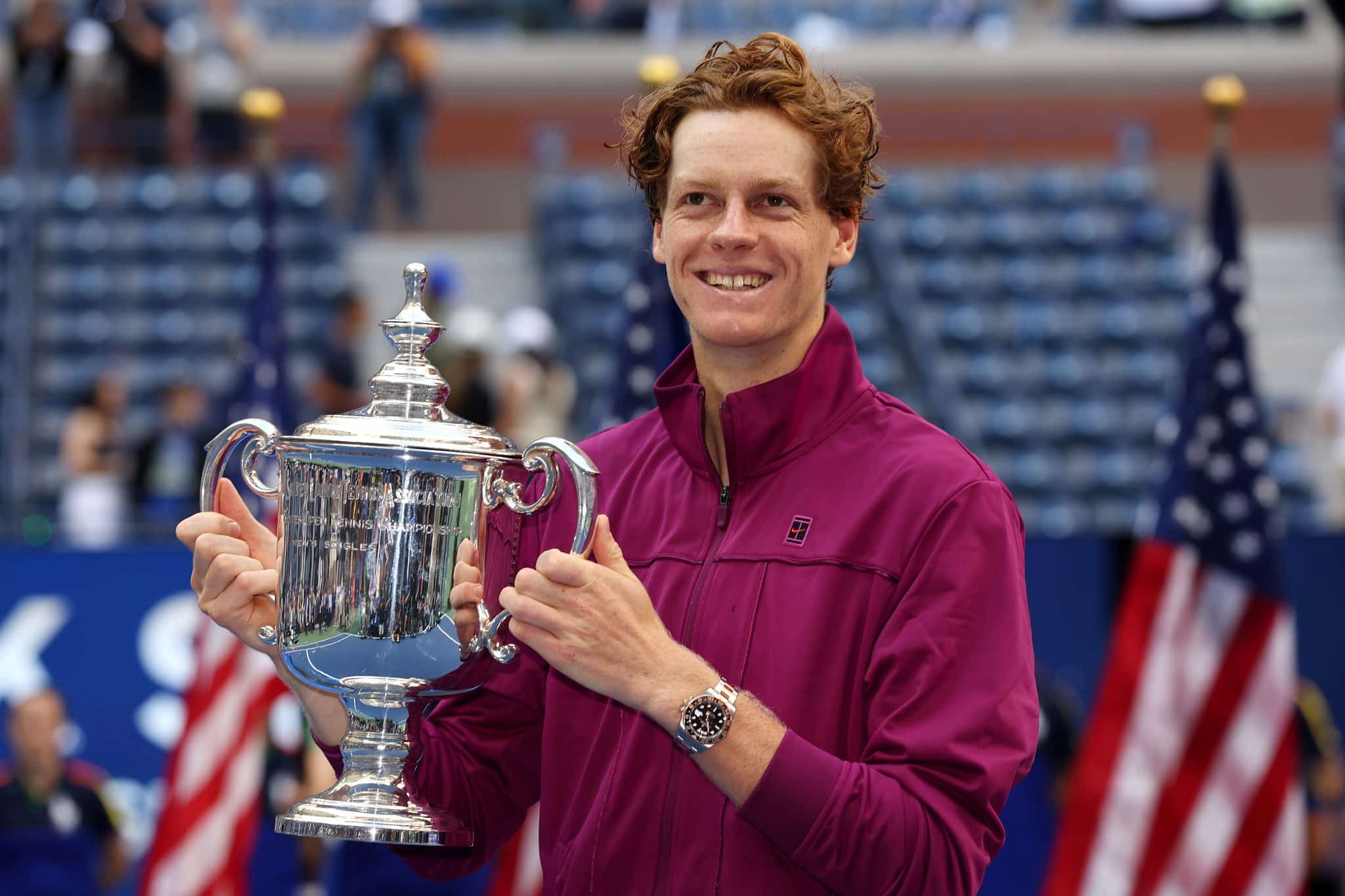 Jannik Sinner of Italy celebrates with the winners trophy after defeating Taylor Fritz of the United States to win the Men's Singles Final on Day Fourteen of the 2024 US Open
