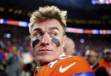 DENVER, CO - JANUARY 5: Quarterback Bo Nix #10 of the Denver Broncos walks off the field after a 38-0 win against the Kansas City Chiefs at Empower Field at Mile High on January 5, 2025 in Denver, Colorado.