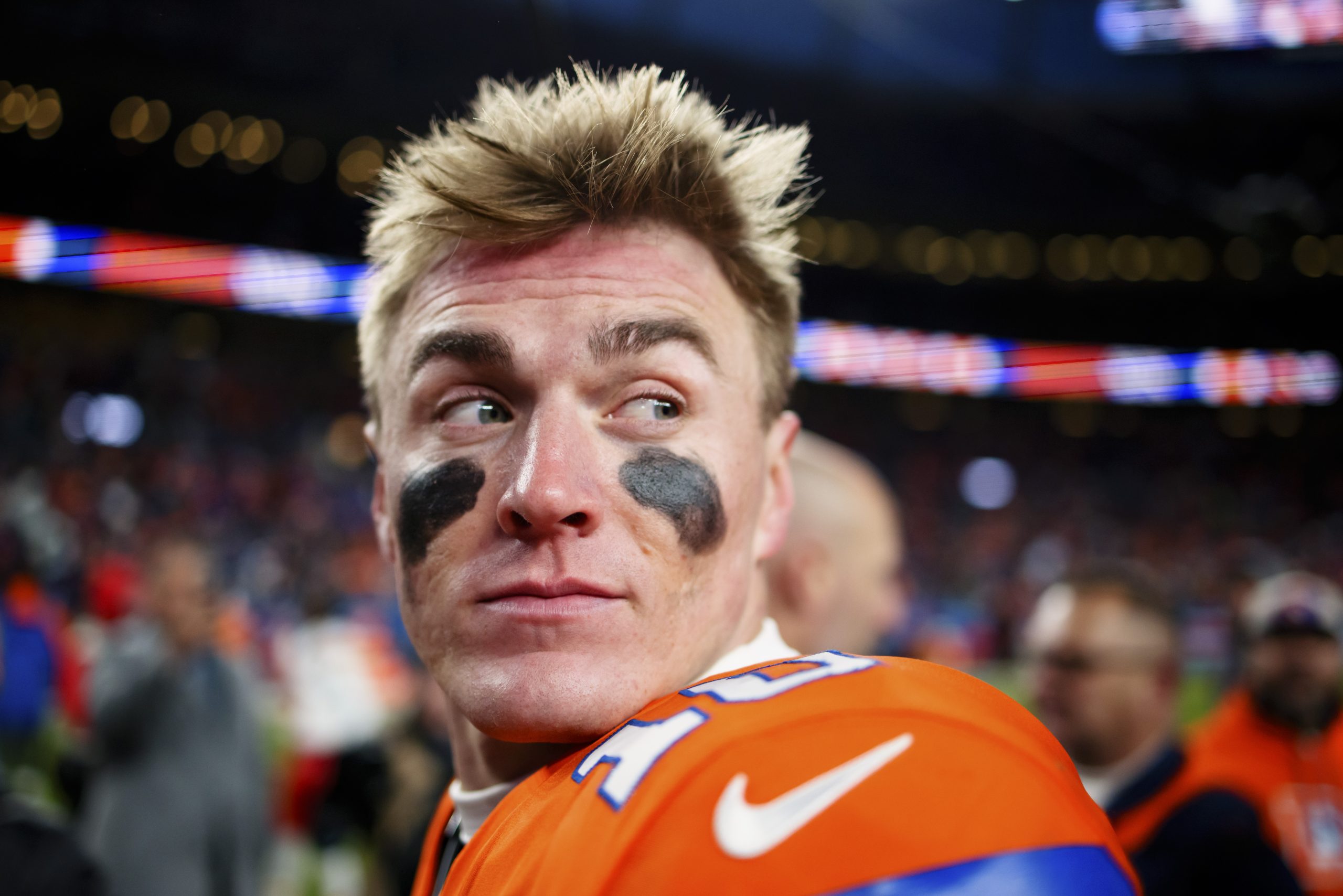 DENVER, CO - JANUARY 5: Quarterback Bo Nix #10 of the Denver Broncos walks off the field after a 38-0 win against the Kansas City Chiefs at Empower Field at Mile High on January 5, 2025 in Denver, Colorado.